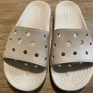 2 pairs of Crocs